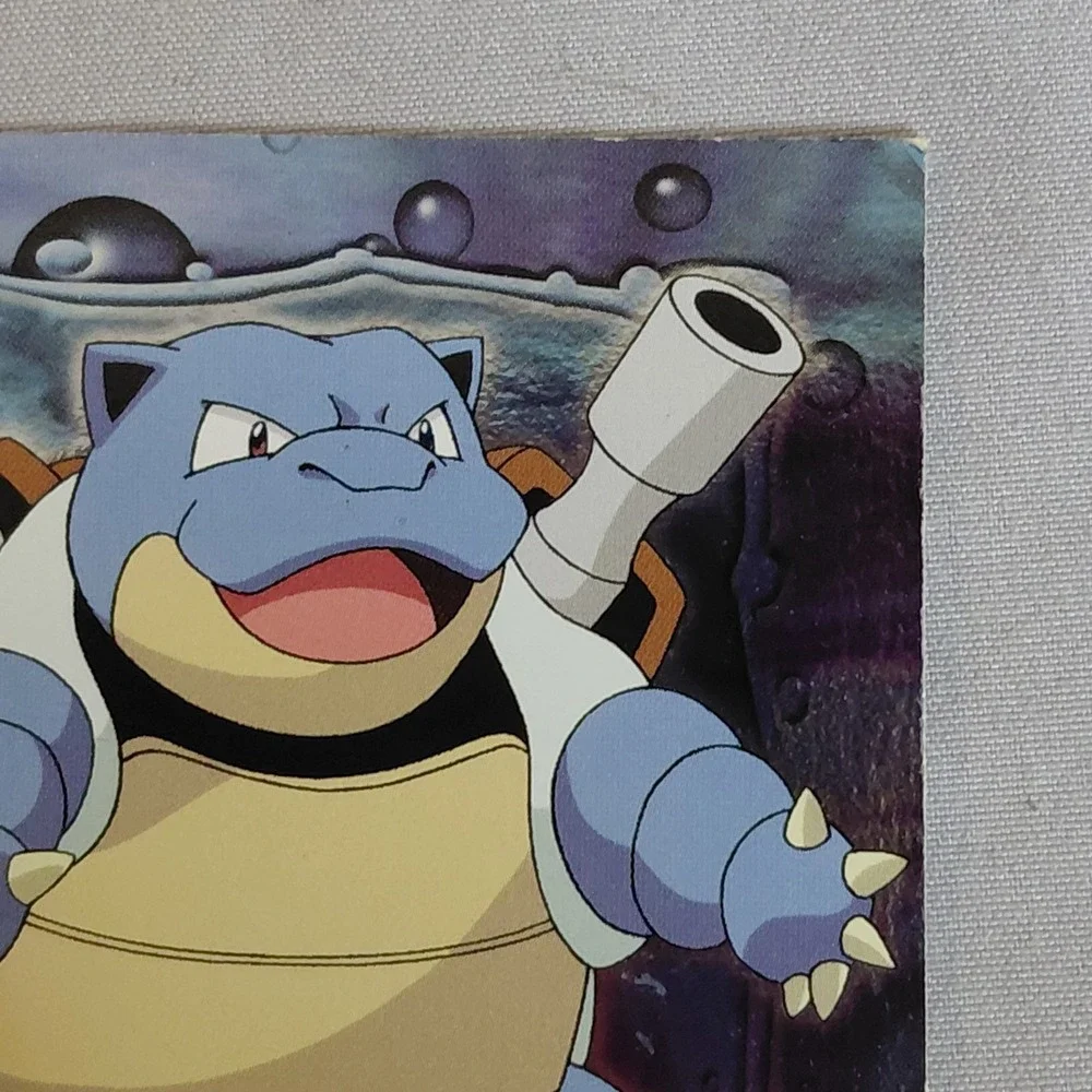 1999 Topps Pokemon Blastoise E9 Rainbow Holo Foil Blue Logo Movie Evolution